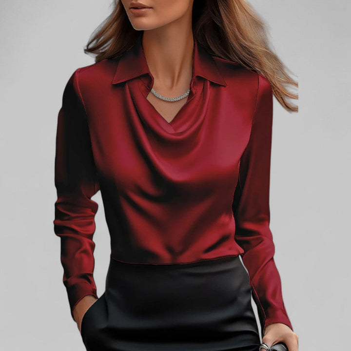 Klasyczna damska bluzka z długim rękawem i drapowanym dekoltem. Stylowa i elegancka bluzka do pracy. Moda dla kobiet.