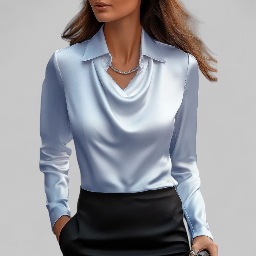 Damska bluzka z drapowanym dekoltem i długim rękawem, modelka. Elegancka bluzka do pracy, na wieczór, moda damska.
