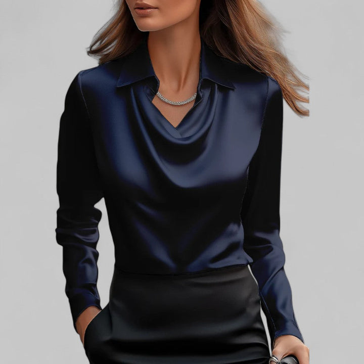 Czarna damska bluzka z drapowanym dekoltem. Elegancka bluzka z długim rękawem, gotowa do modnej stylizacji.