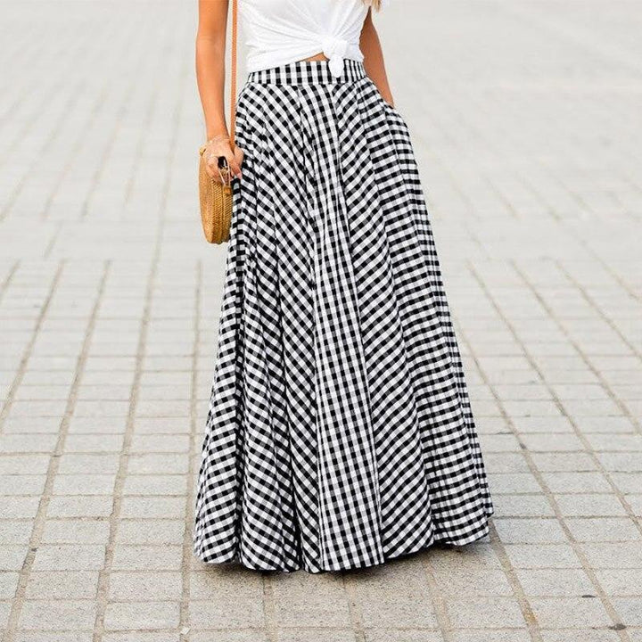 Elegancka damska spódnica maxi w kratę. Rozkloszowana, wygodna i modna, idealna na casualowe wyjścia.
