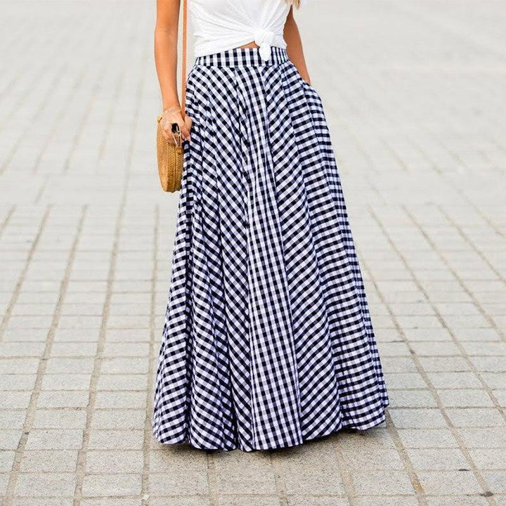 Modna spódnica maxi damska w kratkę. Elegancka i komfortowa, z kieszeniami, świetna do wielu stylizacji.