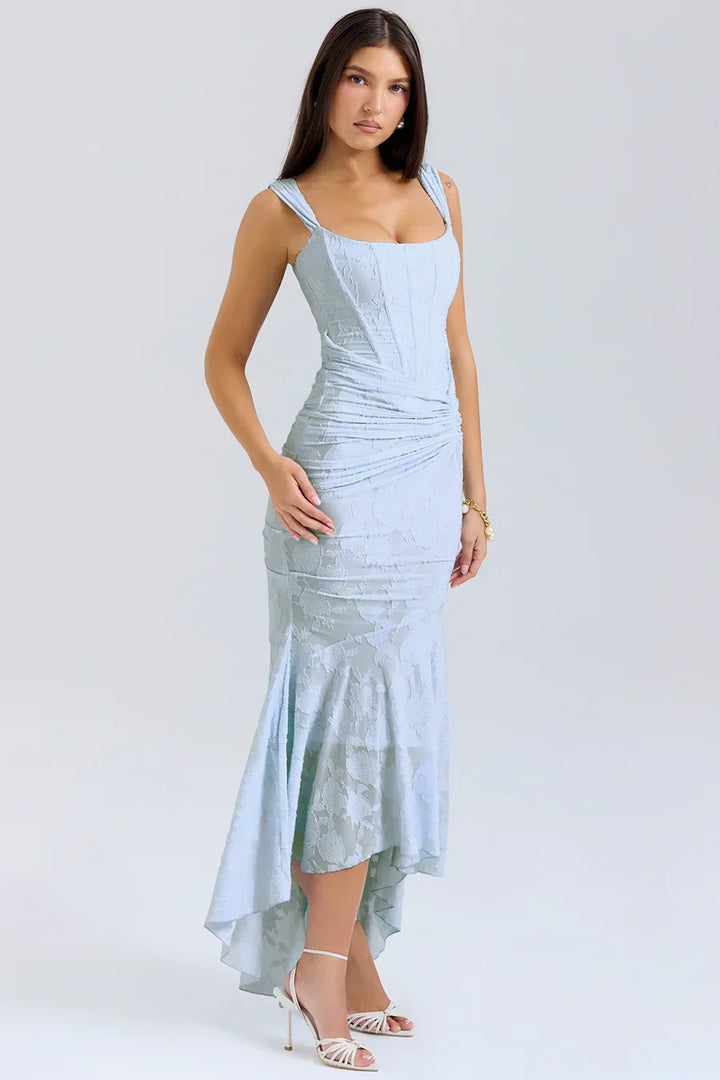Wieczorowa sukienka gorsetowa midi, fason syrenki, marszczona, z asymetrycznym dołem.