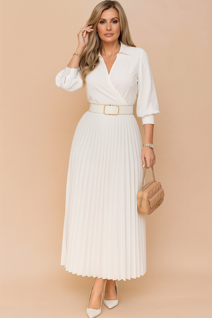 Elegancka damska sukienka midi plus size z dekoltem V i rękawem 3/4. Idealna na wiosnę i do biura.