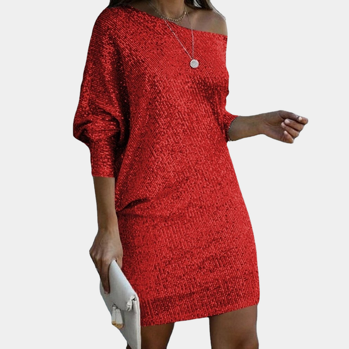 Szykowna damska sukienka wieczorowa z odkrytymi ramionami. Elegancki krój podkreśla figurę, idealna na okazje.