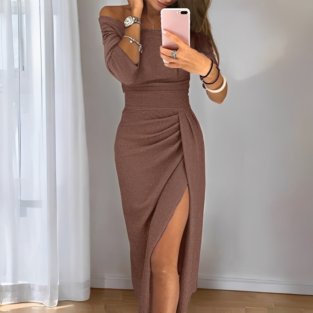 Wyjątkowa elegancka sukienka z rozcięciem, z delikatnego materiału, na specjalne okazje i przyjęcia.
