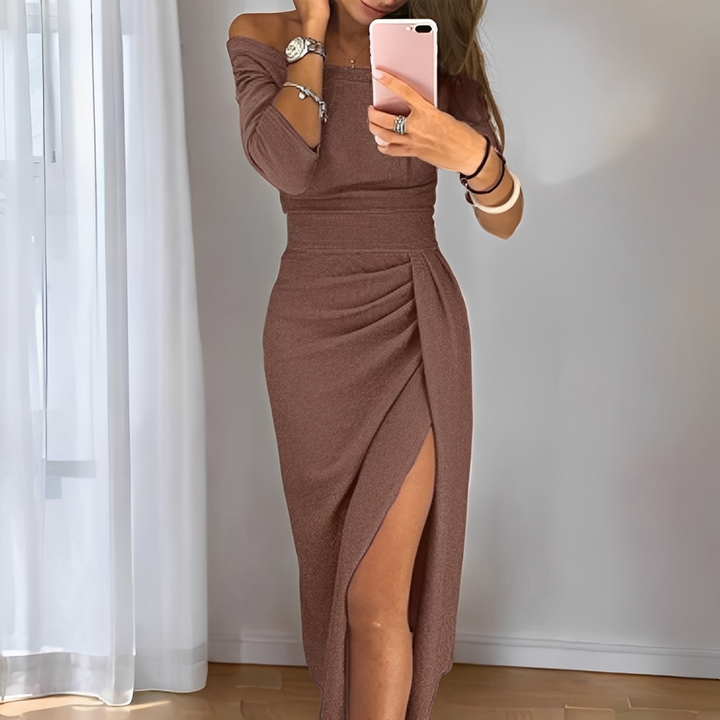 Wyjątkowa elegancka sukienka z rozcięciem, z delikatnego materiału, na specjalne okazje i przyjęcia.