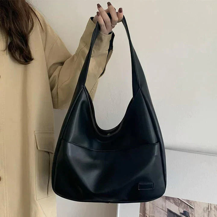 Modna jesienna torba na ramię damska. Szykowna, minimalistyczna i elegancka. Idealne akcesorium dla każdej kobiety.