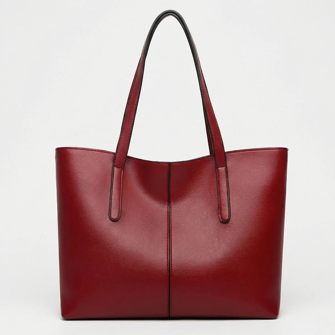 Tylny widok eleganckiej torby damskiej Tote Jessy, z prostym, klasycznym designem. Idealna torebka miejska.