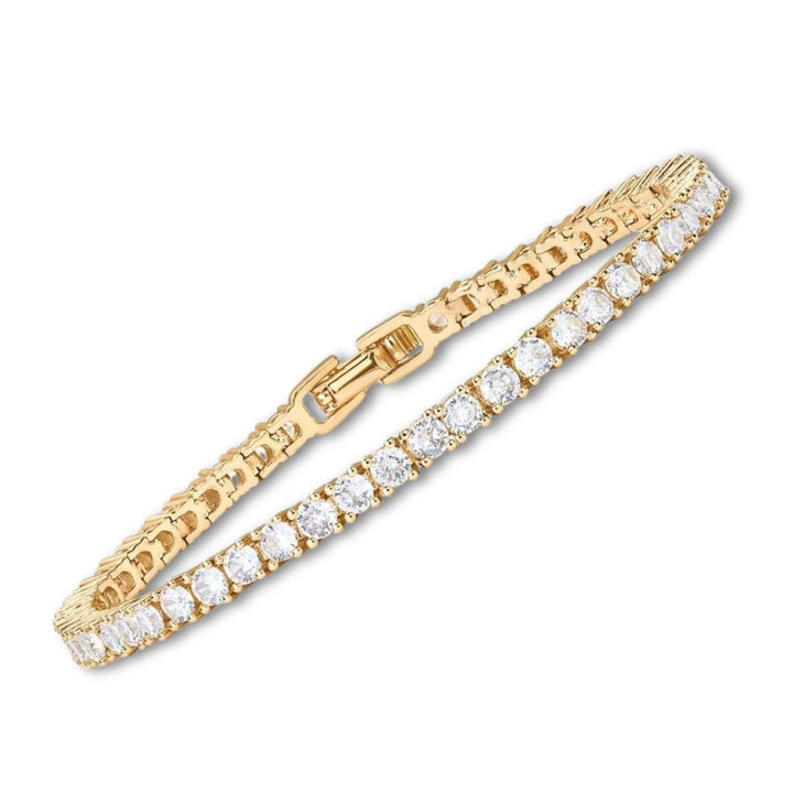 Elegancka damska złota bransoletka tenisowa z błyszczącymi kamieniami moissanite. Idealna biżuteria dla kobiet.