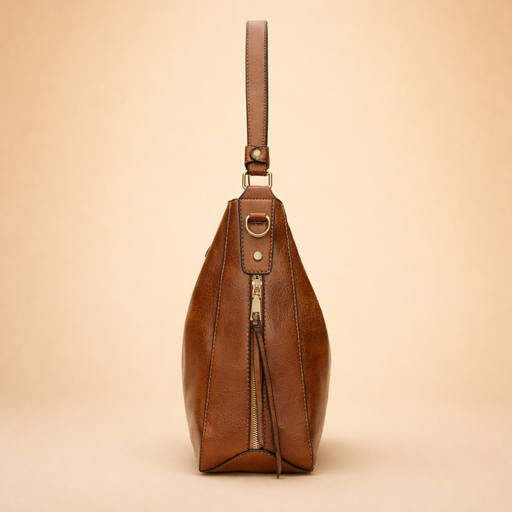 Przód eleganckiej dużej torby damskiej na ramię. Minimalistyczny design i praktyczność torebki hobo dla kobiet.