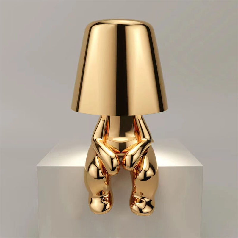 Srebrna lampa LED stołowa, akumulatorowa, z dotykowym włącznikiem i eleganckim wykończeniem.