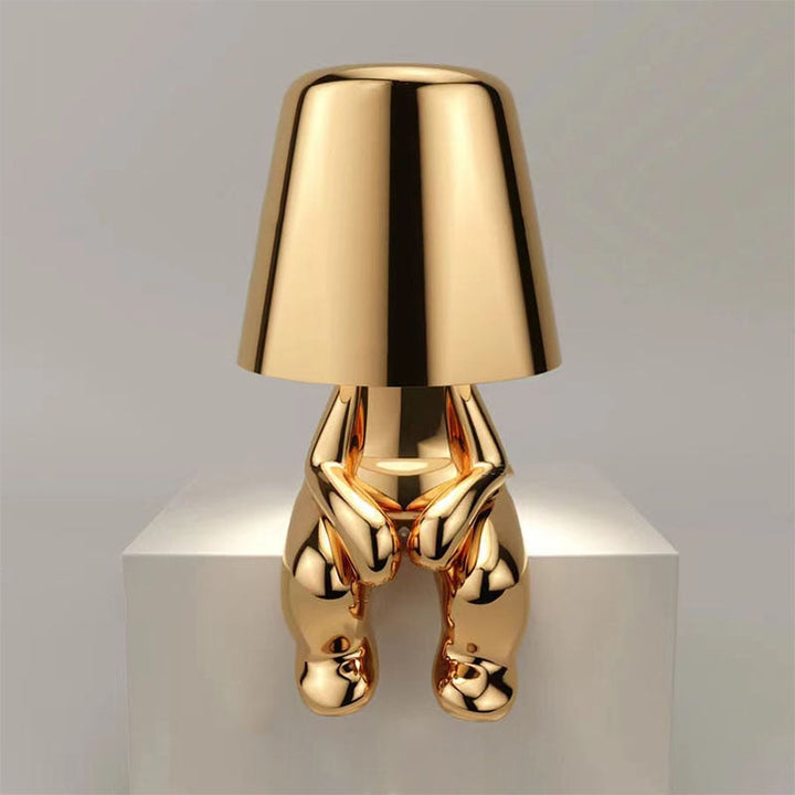 Srebrna lampa LED stołowa, akumulatorowa, z dotykowym włącznikiem i eleganckim wykończeniem.