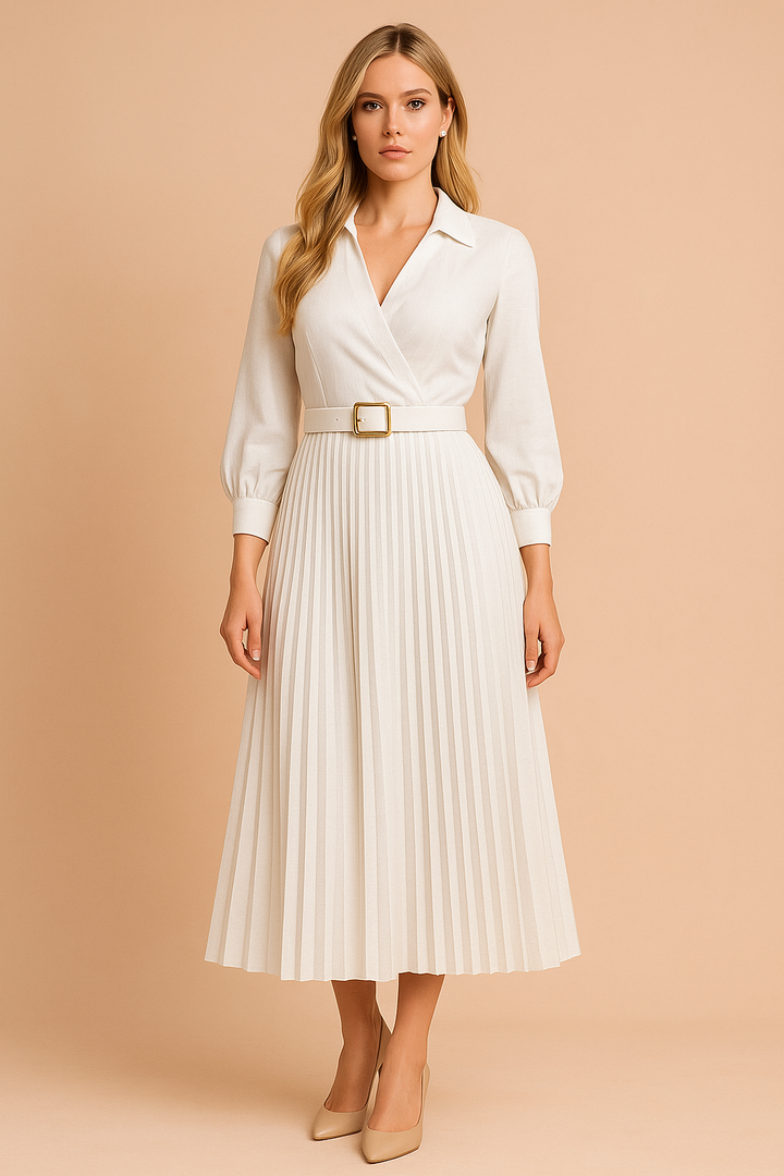 Damska sukienka wizytowa plus size. Plisowana spódnica, elegancki fason midi. Idealna do biura i na specjalne okazje.