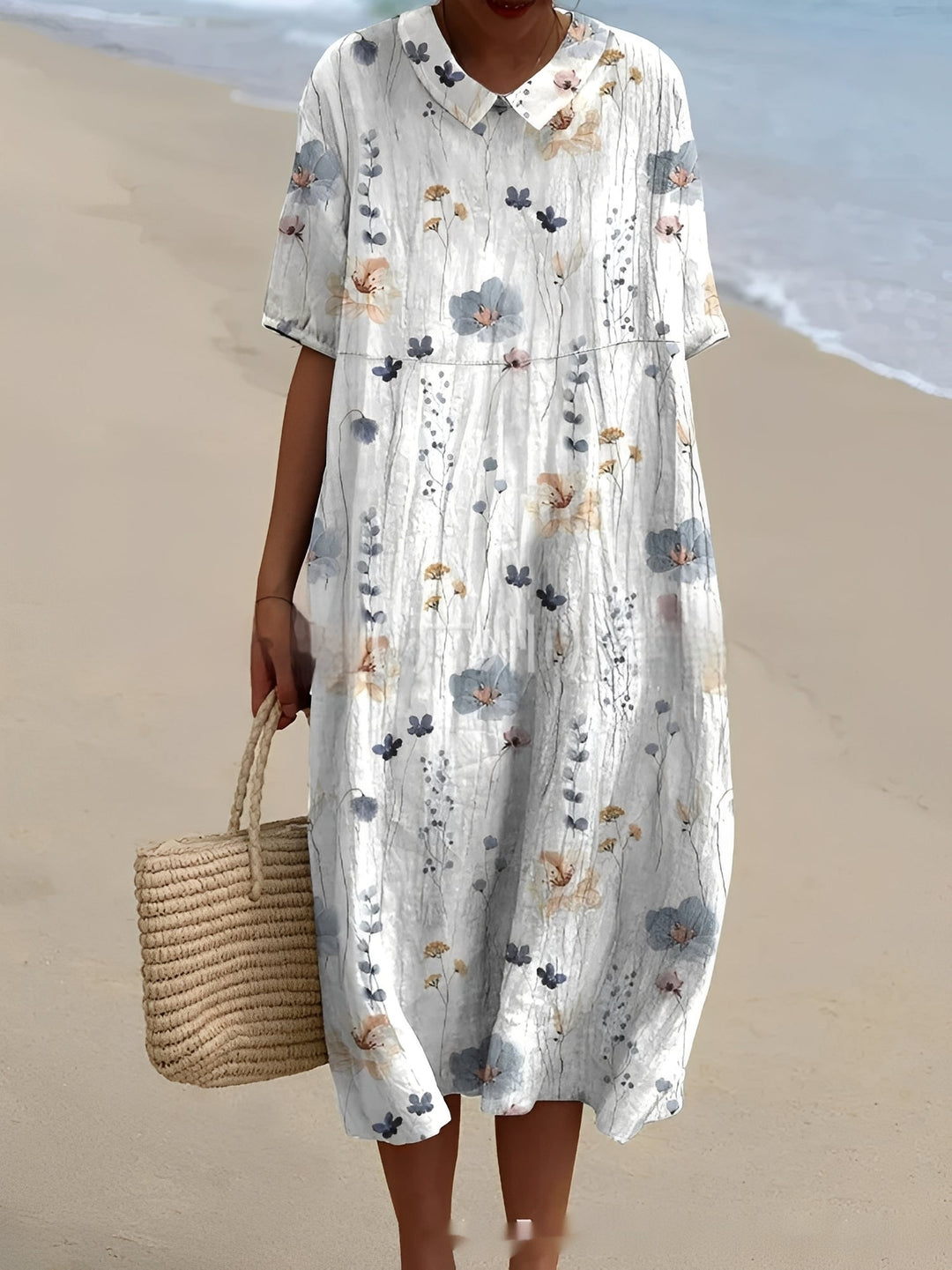 Stylowa sukienka damska Stella retro na lato. Pomarańczowo-białe wzory, idealna na casualowe wyjścia.