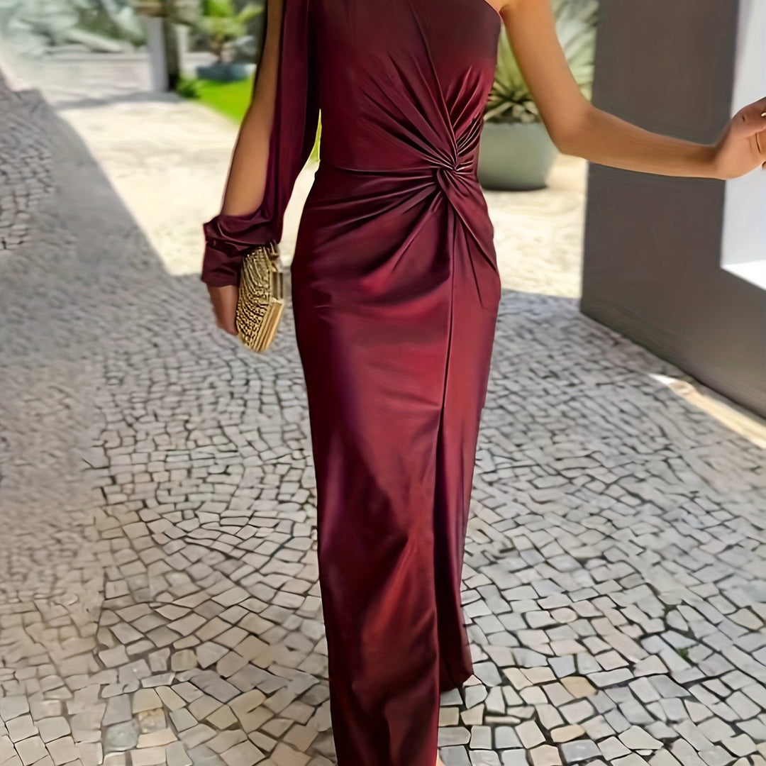 Elegancka sukienka na jedno ramię maxi, wykonana z satynowego materiału, błyszcząca.