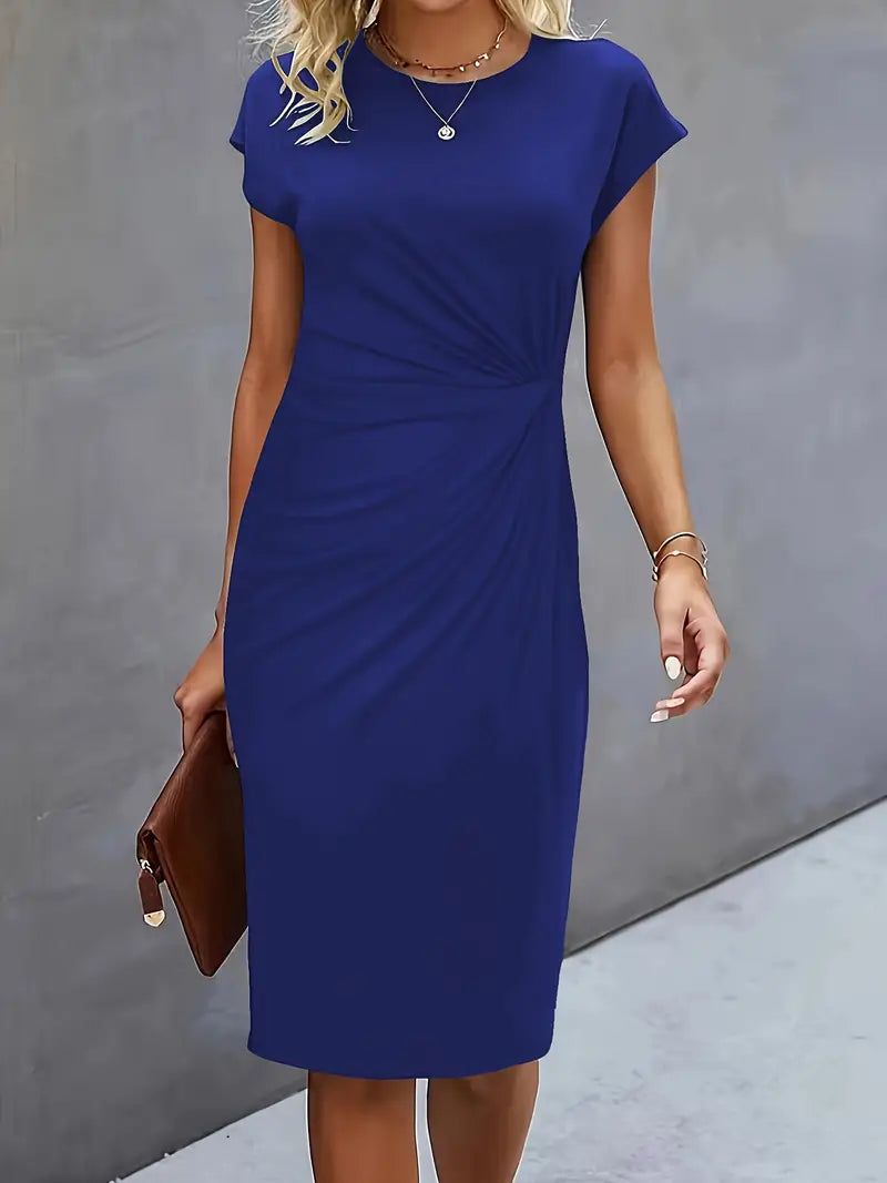 Elegancka sukienka midi z falbanami, z podkreśloną talią. Kobieca moda damska na imprezę.