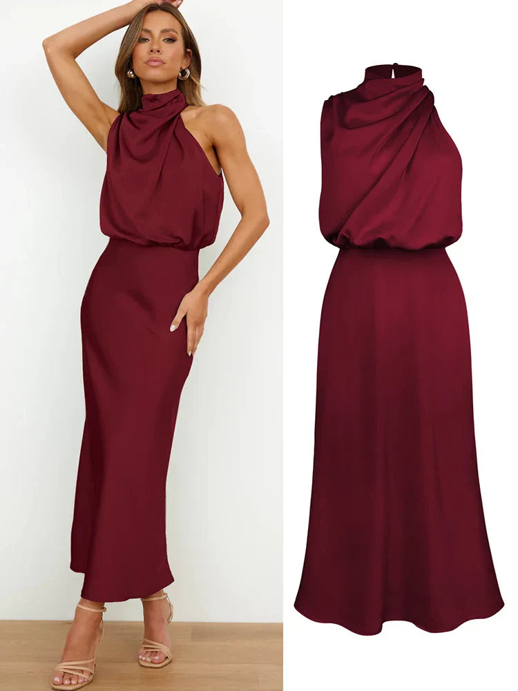 Elegancka sukienka midi na lato. Asymetryczny dekolt halter, doskonała na specjalne okazje.