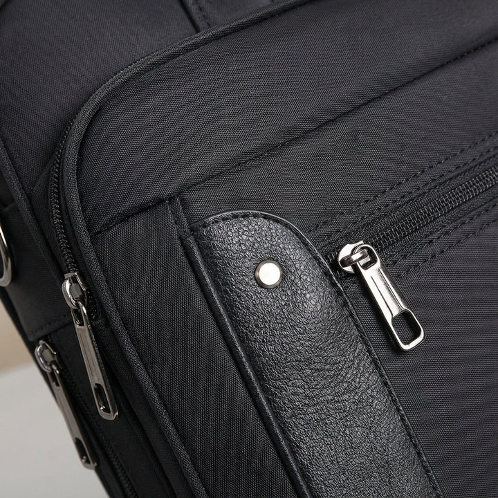 Torba biznesowa na laptopa i dokumenty. Akcesorium biurowe z dużą przestrzenią, idealne do organizacji.