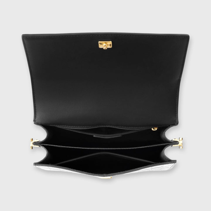 Uniwersalna torebka damska crossbody. Klasyczna czarna torebka na ramię z regulowanym paskiem. Modna i praktyczna.