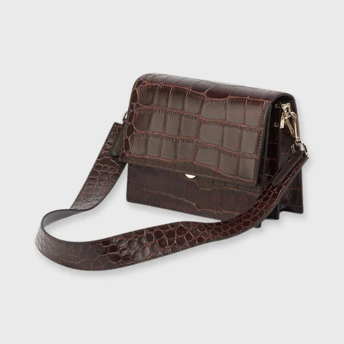 Najnowsza kolekcja: torebka damska crossbody. Modna torebka na ramię, must-have sezonu. Eleganckie akcesorium.