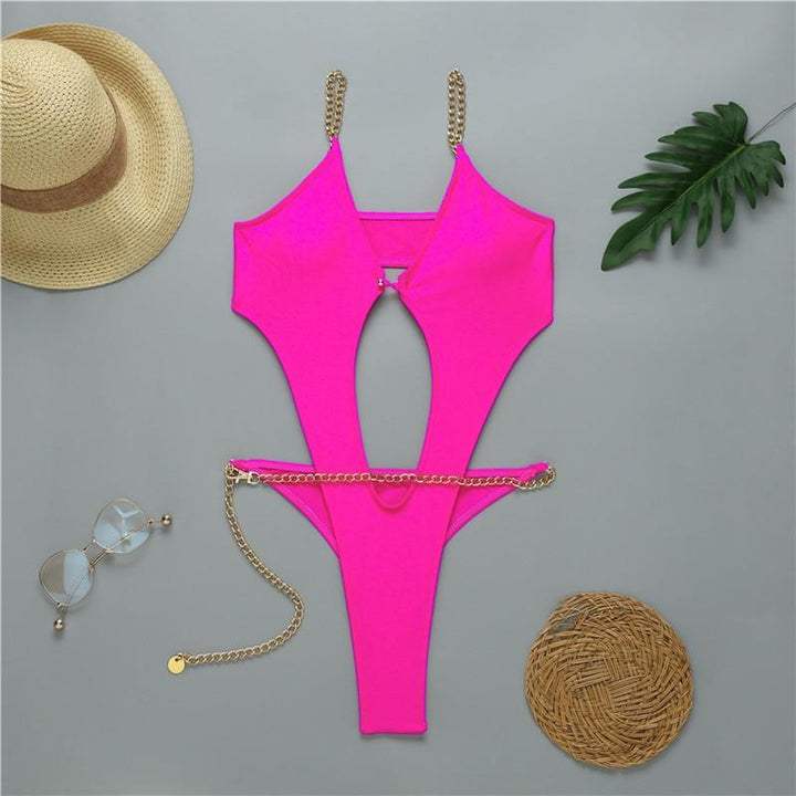 Elegancki damski monokini z łańcuszkami i wycięciami, idealny na lato. Seksowny, szybkoschnący strój.
