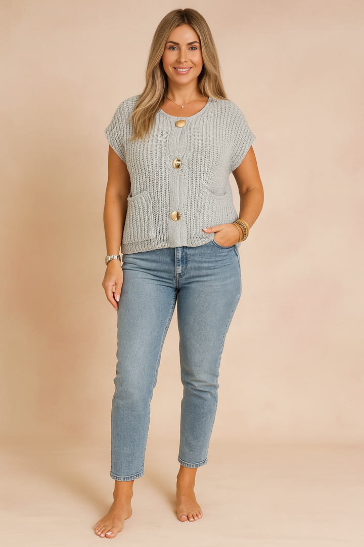 Damski elegancki top bez rękawów, bluzka na guziki. Wygodny i modny wybór do casualowych stylizacji.