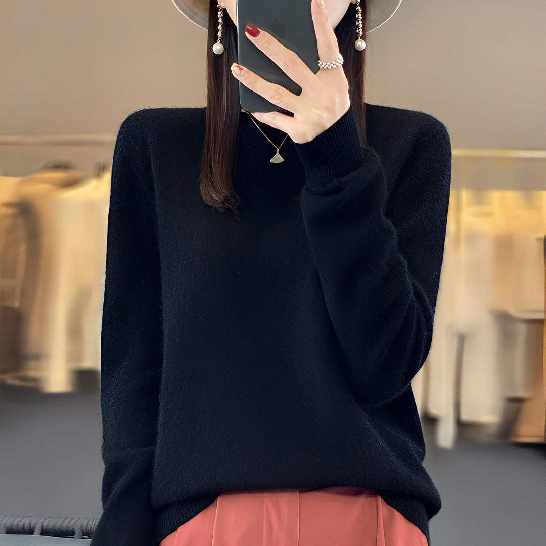 Elegancki i komfortowy sweter damski Cheyanne. Modny sweter beżowy lub czarny z okrągłym dekoltem.