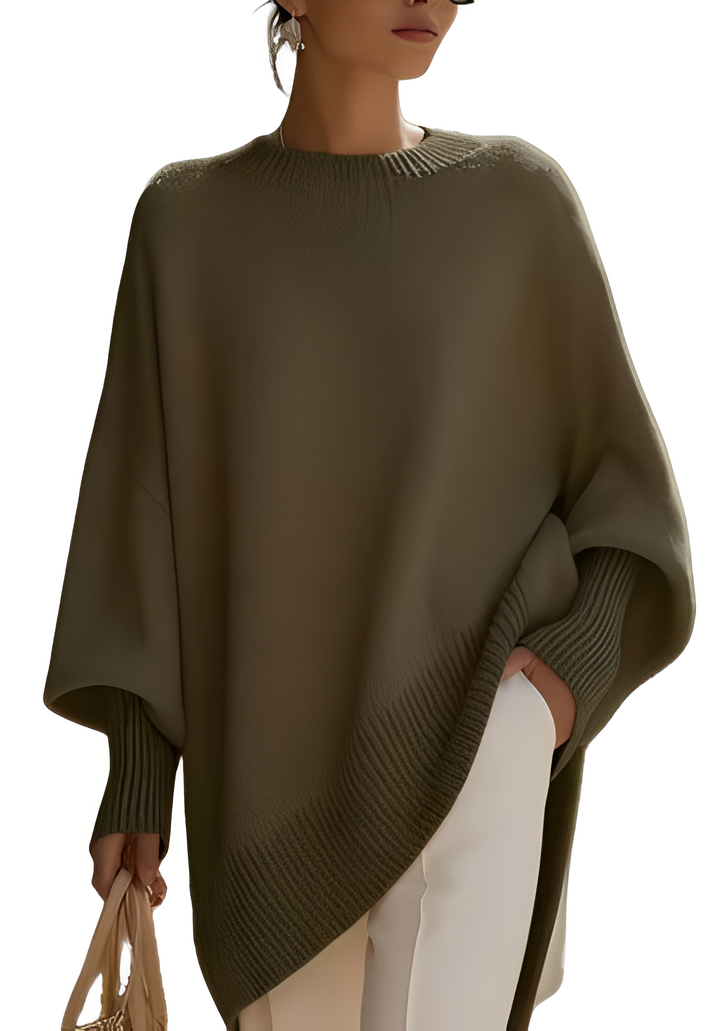Szary sweter damski oversize. Elegancki i luźny, doskonały na co dzień. Zapewnia komfort i modny wygląd.