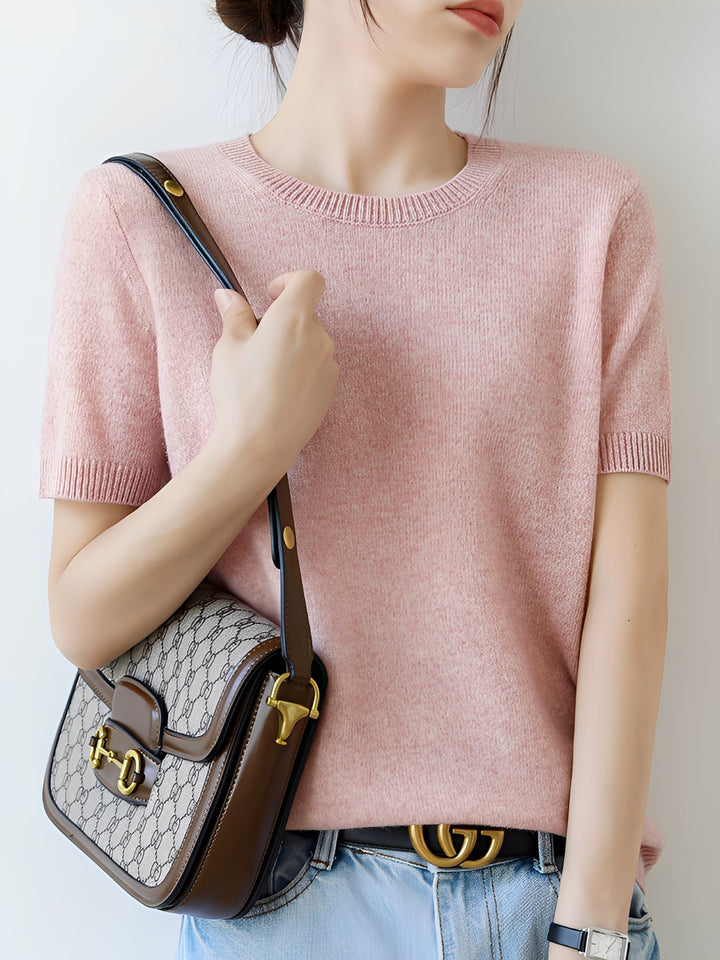 Wygodny sweter damski z krótkim rękawem, podkreślający kobiecość. Wiosenny must-have.