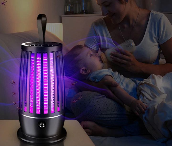 Białe urządzenie do zwalczania owadów z lampą UV. Elektroniczna pułapka na komary i muchy do domu.