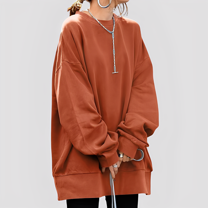 Modny damski sweter oversize Estella, wygodny i elegancki, idealny do casualowych stylizacji na co dzień.