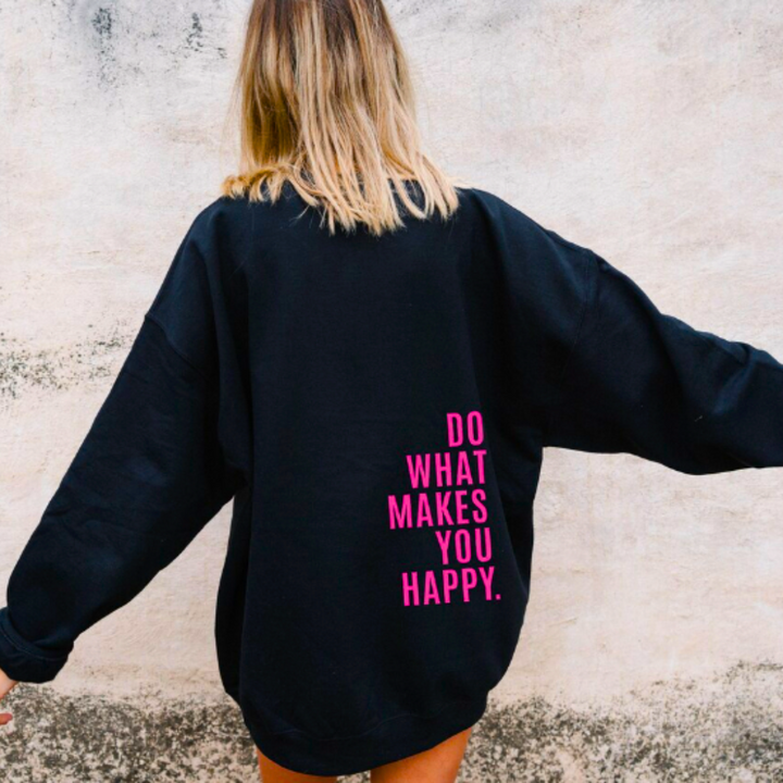 Modna bluza damska oversize z kapturem i dużym nadrukiem na plecach. Casualowy styl, zapewnia komfort na co dzień.