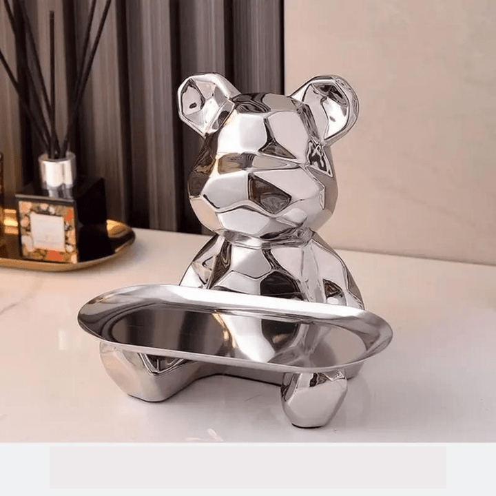Wysokiej jakości ceramiczna figurka geometrycznego niedźwiedzia. Elegancka dekoracja i stylowy organizer.