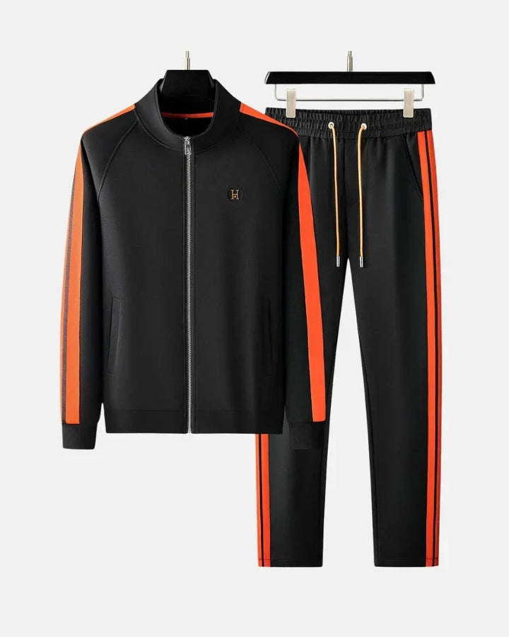 Wygodny dres męski sportowy w odcieniach czerni, idealny na aktywny dzień i wieczorny relaks.