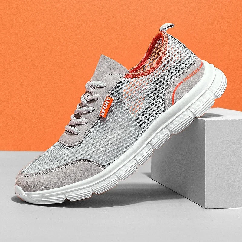 Boczny widok szarych męskich sneakersów sportowych