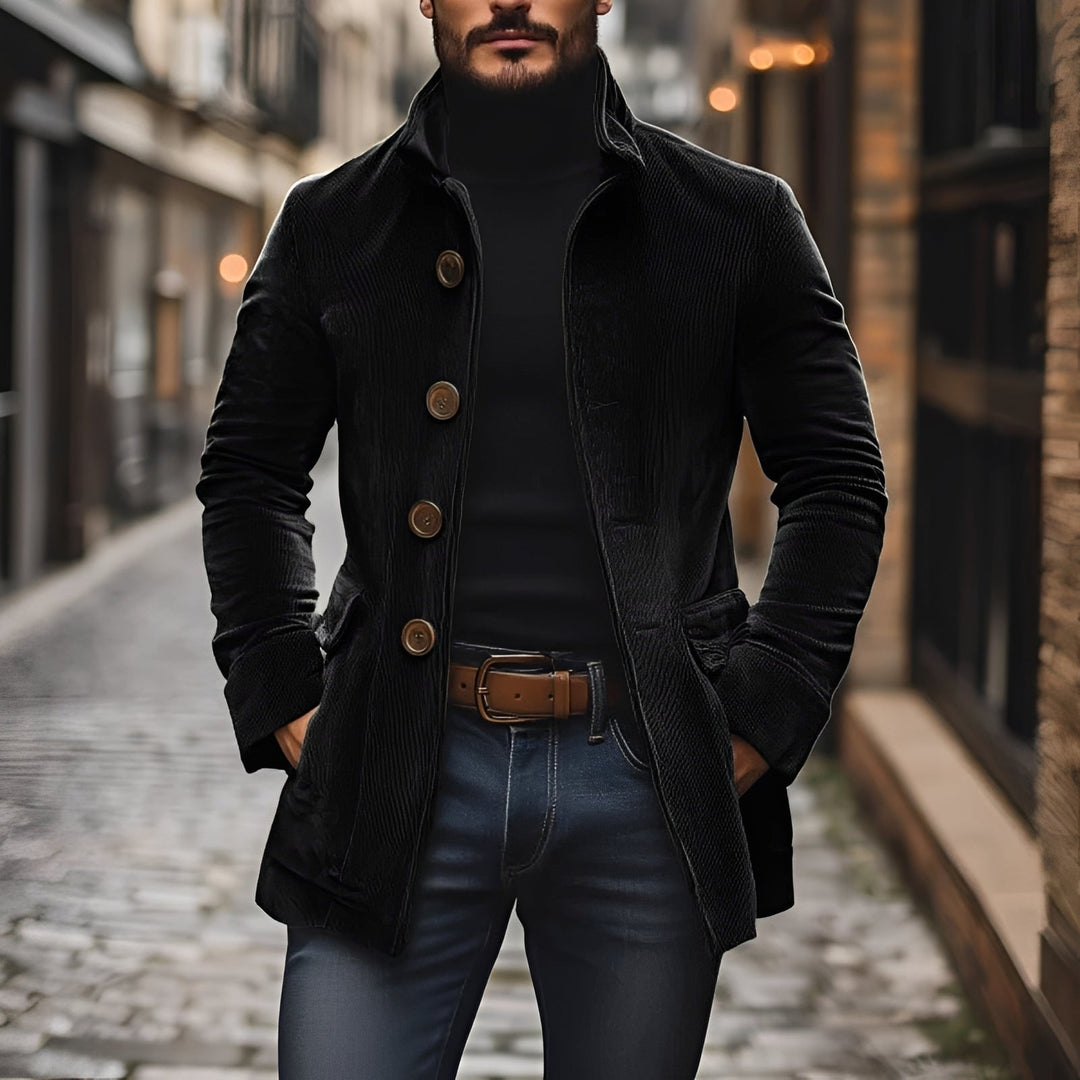 Mężczyzna w eleganckiej czarnej kurtce męskiej na guziki