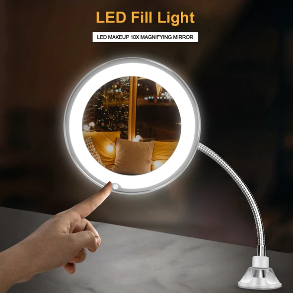 Lustro z oświetleniem LED do makijażu w zbliżeniu na taflę szkła