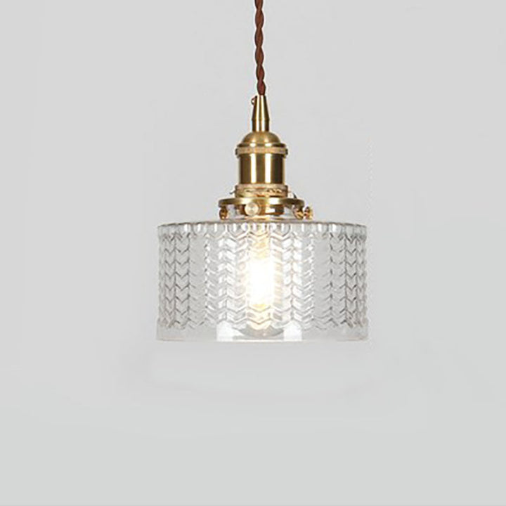 Japońska szklana lampa wisząca nad stół w jadalni. Minimalistyczna dekoracja.