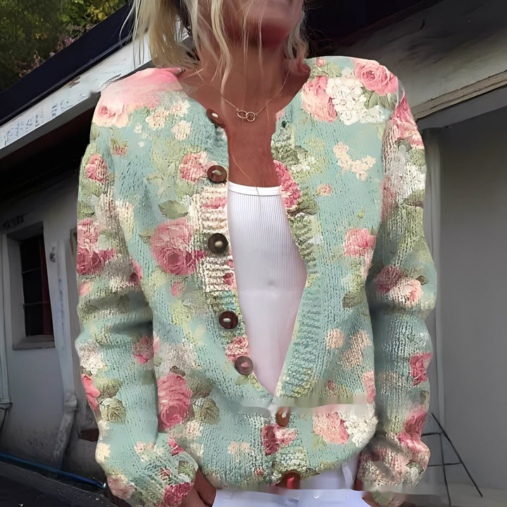 Wygodny kardigan damski z pięknym wzorem kwiatowym. Idealny na jesienne i wiosenne stylizacje, modny i elegancki.