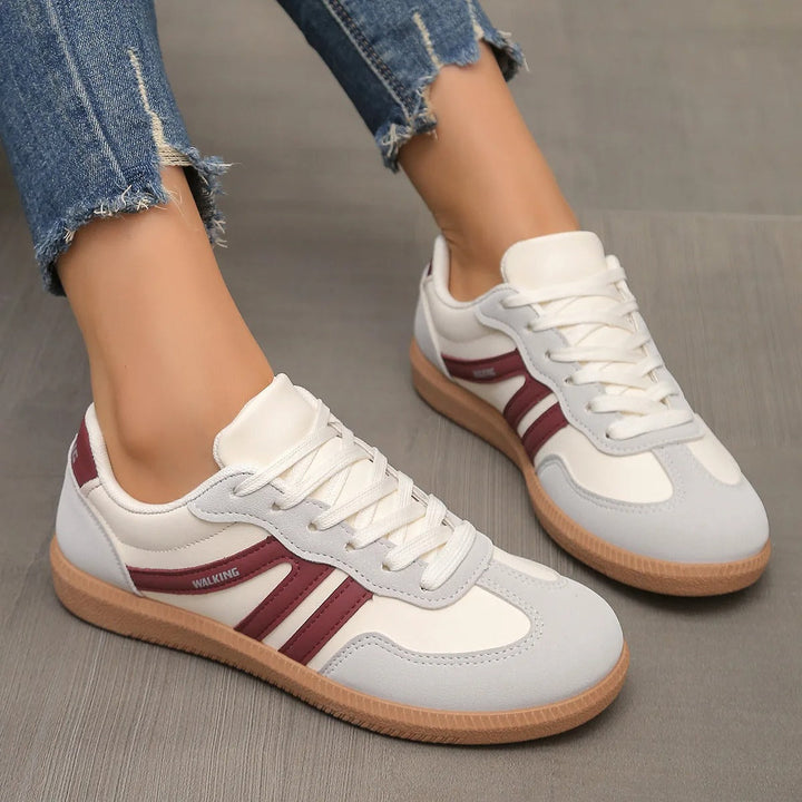 Damskie niskie sneakersy sportowe w modnym stylu miejskim, ujęcie z boku