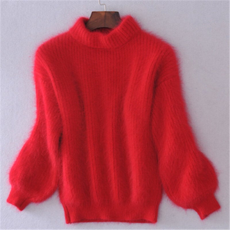 Modny damski sweter z wełny o grubym, luźnym splocie, idealny na chłodne dni. Styl i wygoda.