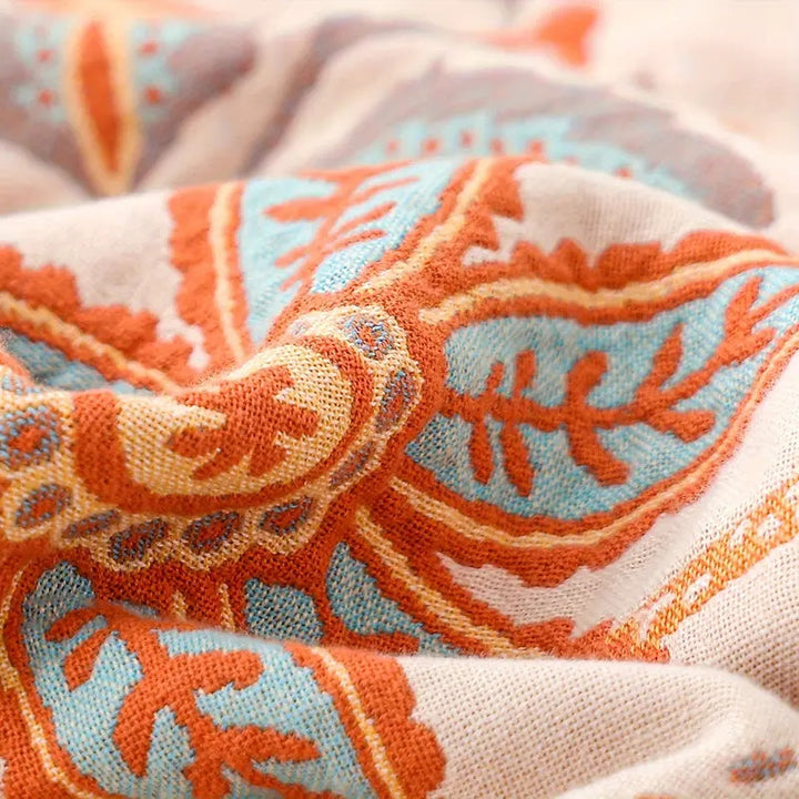 Designerski koc boho z modnym kwiatowym wzorem. Stylowa narzuta, dekoracja do salonu, sypialni. Tekstylia.