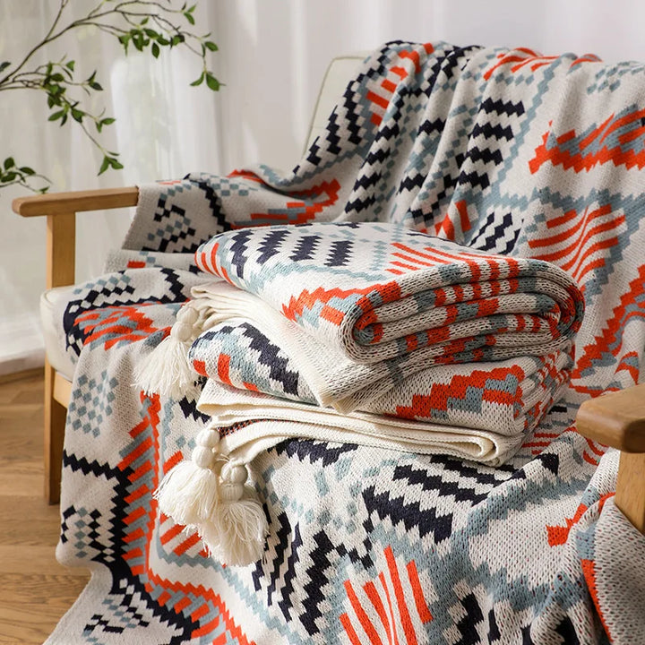 Koc nordic boho, uniwersalna narzuta na łóżko lub pled do salonu. Stylowa dekoracja domu, komfortowe tekstylia.