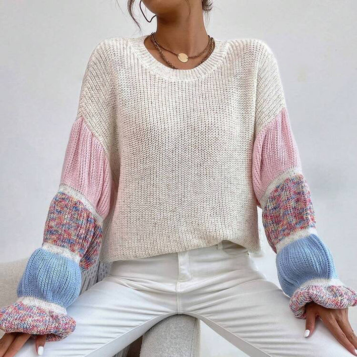 Stylowy, kolorowy sweter damski z luźnym fasonem. Wygodny sweter na wiosnę i jesień, doskonały do wielu stylizacji.