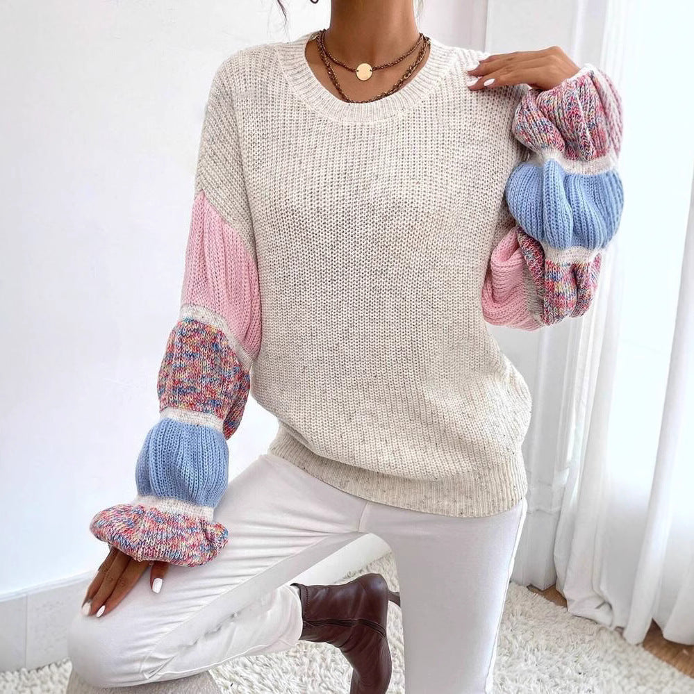 Uniwersalny, kolorowy sweter damski o luźnym kroju. Modny i wygodny sweter casualowy na jesień i wiosnę.