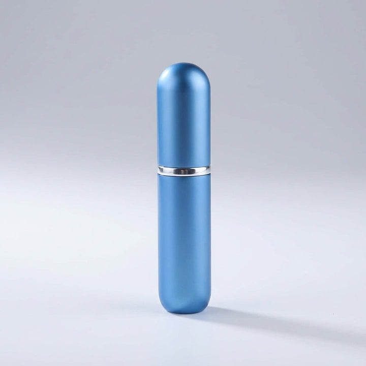 Napełniany atomizer perfum PocketMist, miniaturowy flakon na zapach, praktyczny w podróży.