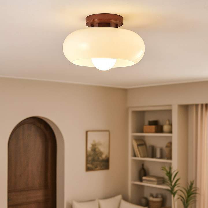Designerska lampa sufitowa LED Bauhaus, kremowa, minimalistyczna, zapewniająca ciepłe światło do wnętrz.