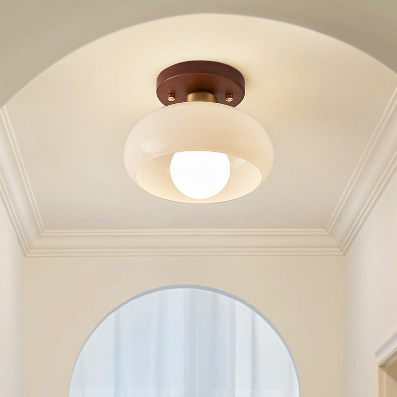 Nowoczesna kremowa lampa sufitowa LED Bauhaus, idealna jako oświetlenie dekoracyjne do wnętrz.