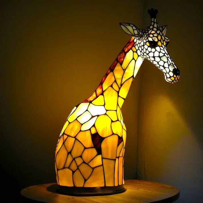 Artystyczna lampa stołowa z nastrojowym światłem, czarny metal, unikalny design.