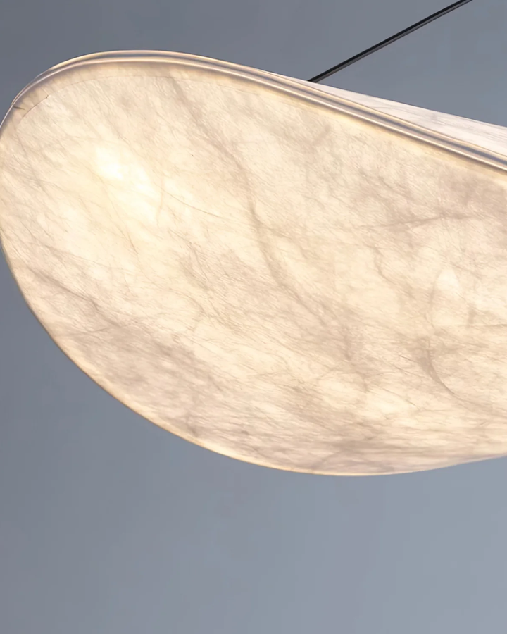 Nowoczesna lampa sufitowa Japandi z unikalnym efektem zaćmienia, idealna do współczesnych wnętrz.